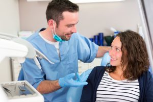 dentist talking to patient about sedation dentistry options