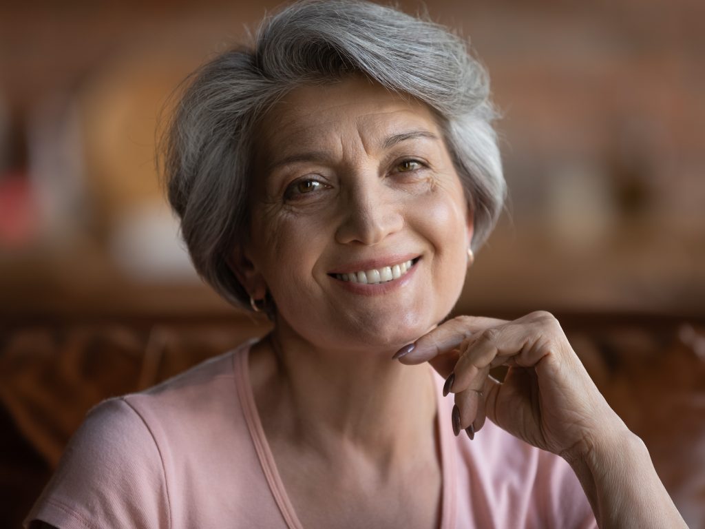 Old Woman Wearing Cosmetic Dentures