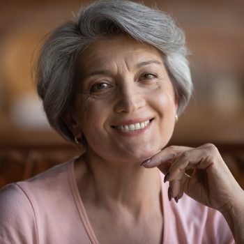 Old Woman Wearing Cosmetic Dentures