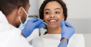 A woman is protecting her oral health with general dentistry